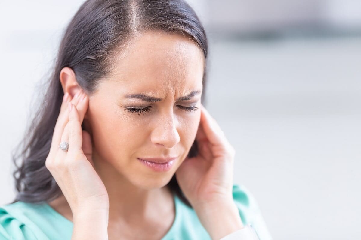 A girl finding tinnitus relief
