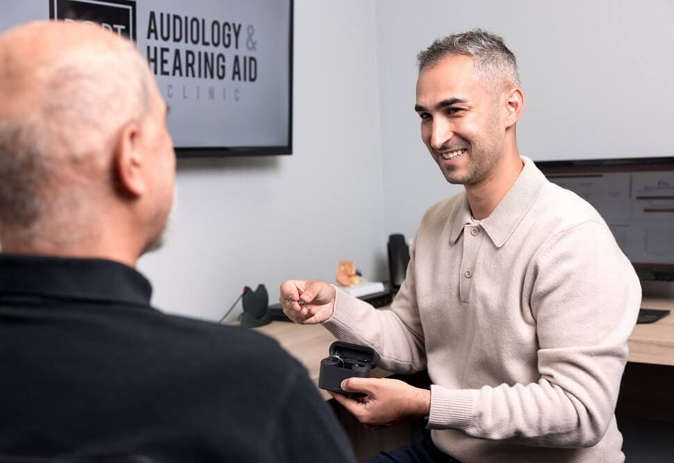 Dario Colleta, Doctor of Audiology Speaking with Patient at Port Credit Audiology