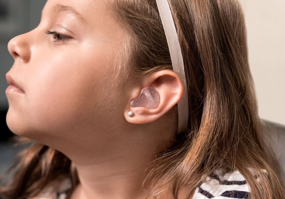 A Young Girl With Custom Earmold at Port Credit Audiology